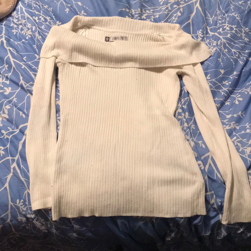 Off the shoulder long sleeved .